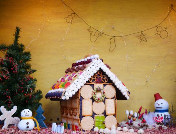 istock Snowman and sweets house 1079130812