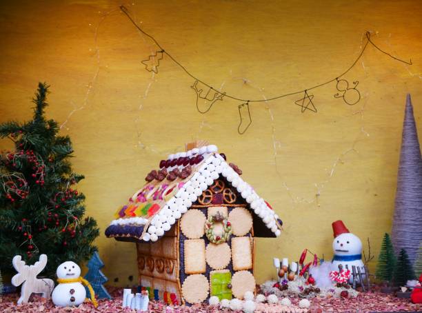 istock Snowman and sweets house 1079130828