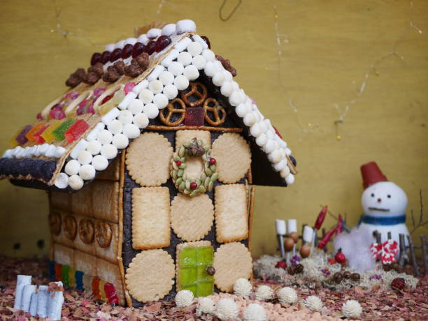istock Snowman and sweets house 1079130840