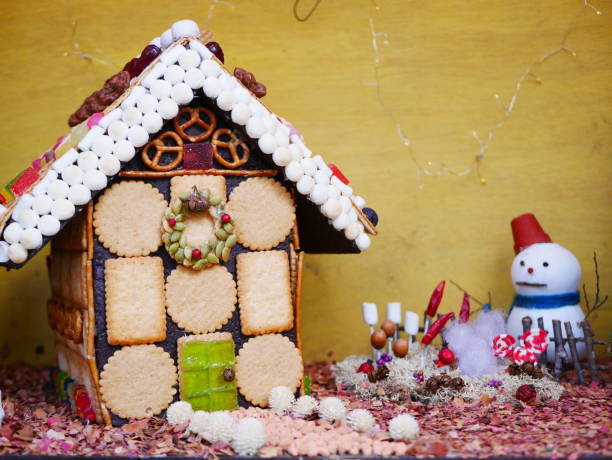 istock Snowman and sweets house 1079130842