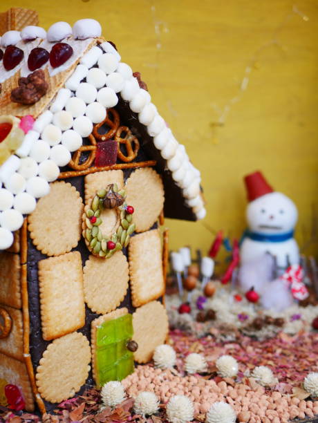 istock Snowman and sweets house 1079130850