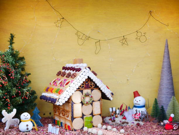 istock Snowman and sweets house 1079130960