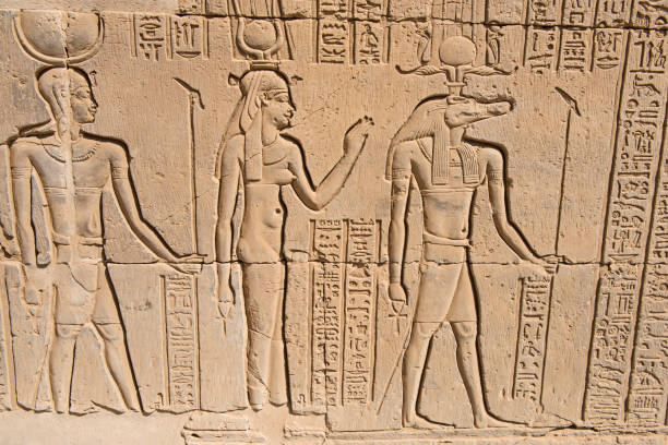 istock Hieroglyphic carvings on an ancient egyptian temple wall 1079131032