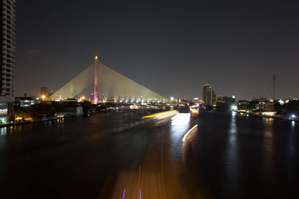 istock Chao Phraya river at night with illuminated bridge in Bangkok, Thailand 1079132588