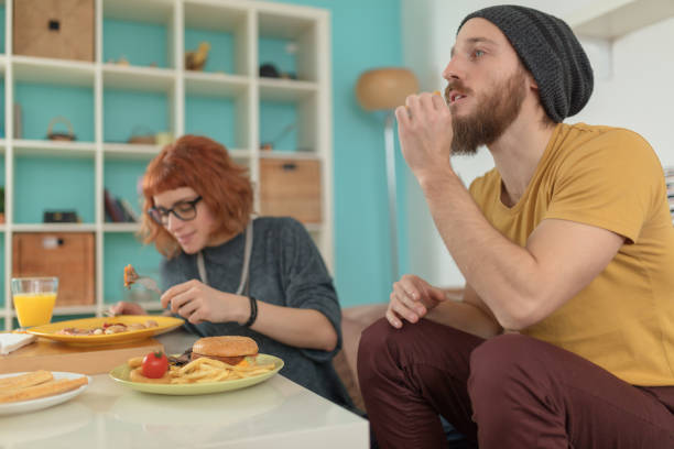 istock Modern young couple eating fast food 1079132714