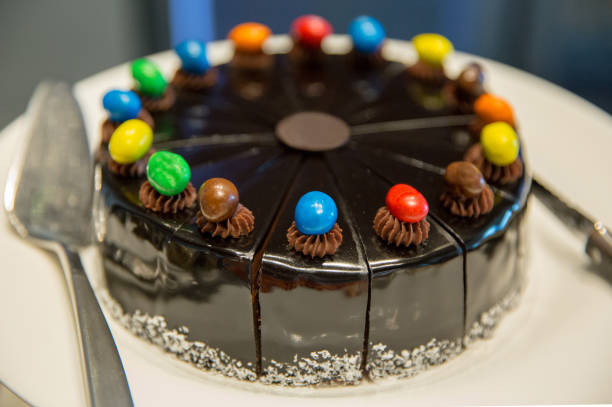 istock Chocolate cake with Bean Chocolate Candy on top 1079134718
