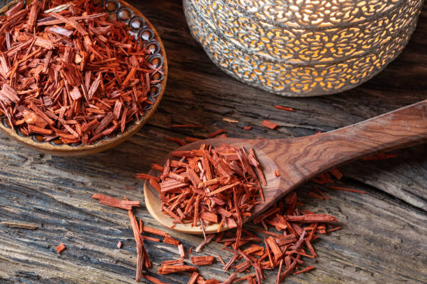 Red sandalwood on a spoon Red sandalwood on a wooden spoon sandalwood stock pictures, royalty-free photos & images