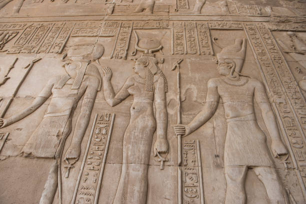 istock Hieroglyphic carvings on an ancient egyptian temple wall 1079142800