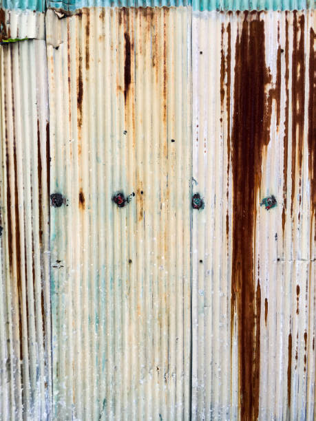 istock Rusty Corrugated metal texture or Galvanized iron steel texture, Beige colour and Green Colour, Abstract Background 1079144358
