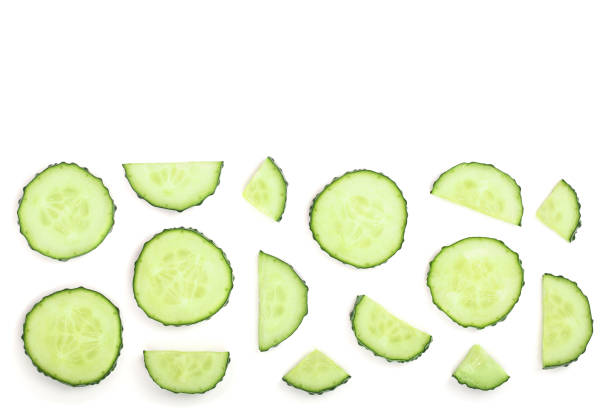 istock Cucumber slices isolated on white background with copy space for your text. Top view. Flat lay pattern. Set or collection 1079146554