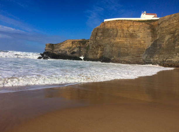 istock sea waves and rocks, sea surf 1079159326