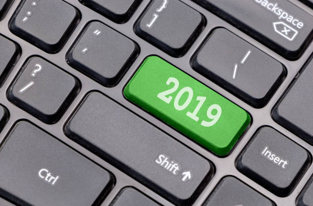 istock 2019 on green enter key, of a black keyboard. 1079160276