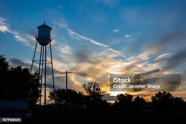 Small Town Life Stock Photo - Download Image Now - Small Town America, Water Tower - Storage Tank, Small Town