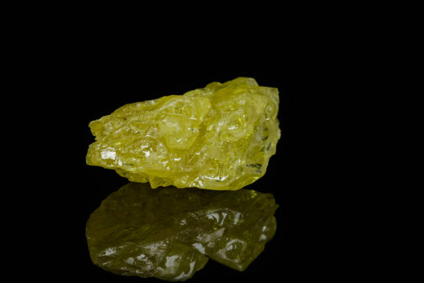 istock Macro mineral sulfur stone on a black background 1079175668