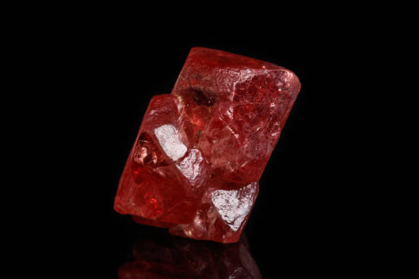 istock Macro mineral spinel stone on black background 1079175830
