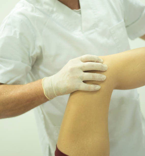 istock Physiotherapy clinic Intratissue Percutaneous Electrolysis EPI dry needling physiotherapist patient injury. 1079192674
