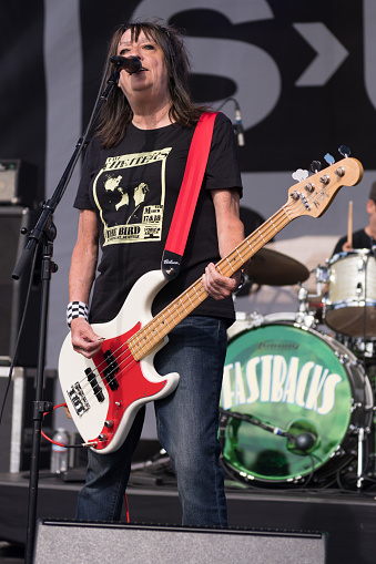 Seattle, USA - Aug 11, 2018: Kim Warnick of the Fastbacks at the SPF30 SUB POP party on the Beach in West Seattle late in the day.