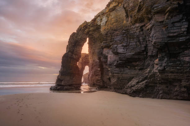istock dyllic sunrise landscape in Cathedrals beach, Ribadeo, Galicia, Spain. 1079217536