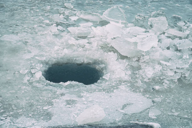 Ice hole in the ice for winter fishing