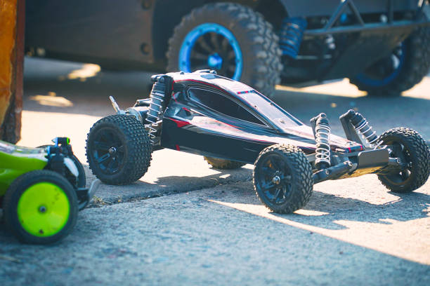 istock Radio-controlled racing car toy on asphalt 1079217622