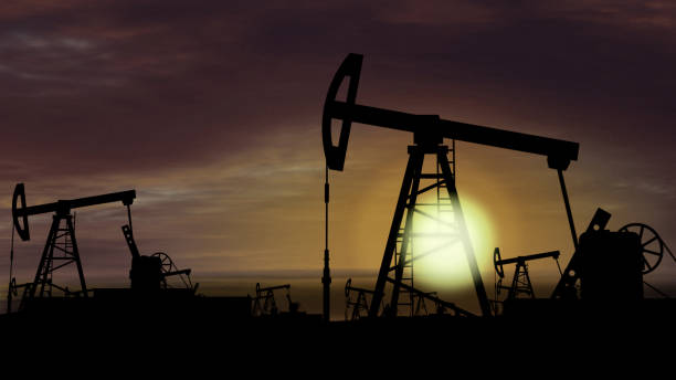istock Oil pumps - oil extraction on sunset background 1079218862