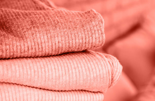 istock Several sweaters of pastel colors. 1079225824