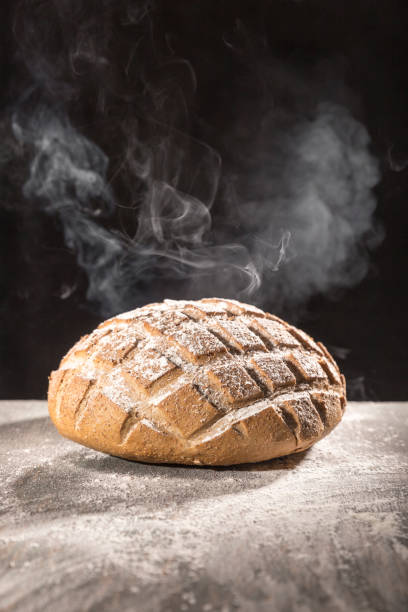 istock Hot, steaming homemade bread 1079231794