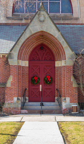 istock Church doors with Christmas wreaths 1079261858