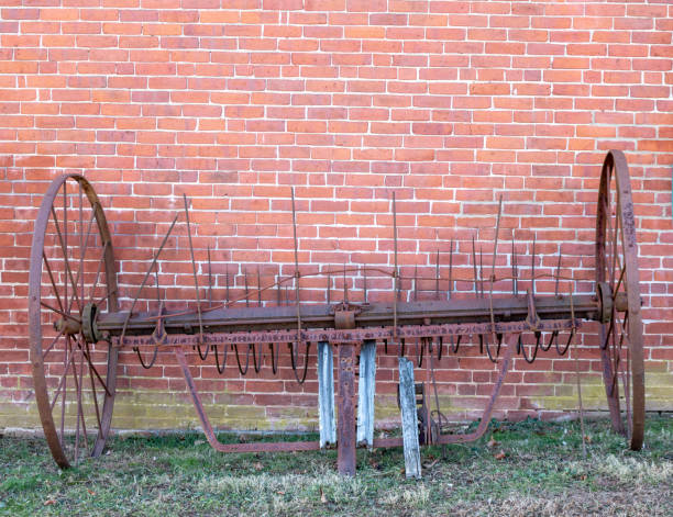 istock Antique cultivator near a brick wall 1079267690
