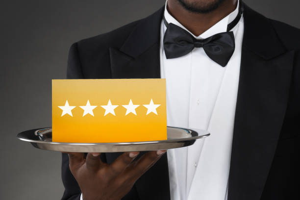 istock Waiter Holding Plate With Star Rating 1079267988