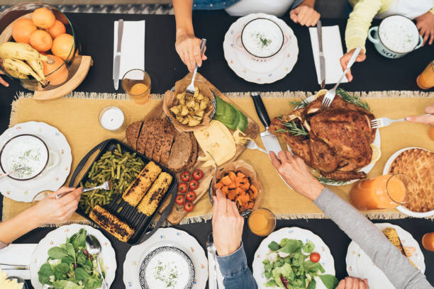 istock Overhead view of table during Christmas dinner 1079297568