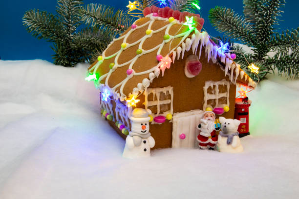 istock Gingerbread House and Santa 1079315926