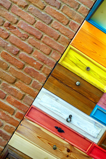 istock Colorful Wooden Drawer and Brick Wall 1079317930