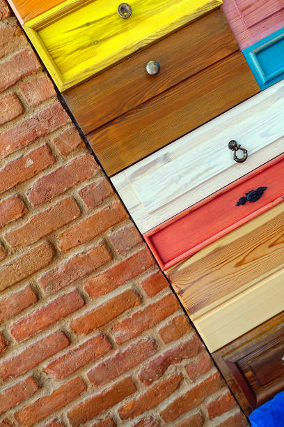istock Colorful Wooden Drawer and Brick Wall 1079319066