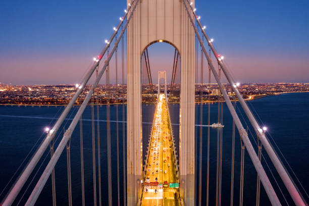 Aerial view of Verrazzano Narrows Bridge Aerial view of the evening rush hour traffic on Verrazzano Narrows Bridge, as viewed from Staten Island, NY high section photos stock pictures, royalty-free photos & images