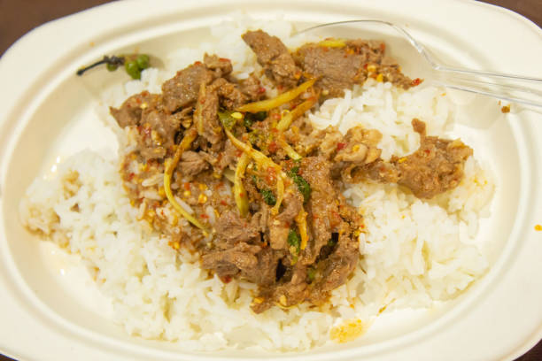istock Deer meat is fried Curry. On the rice. 1079328760