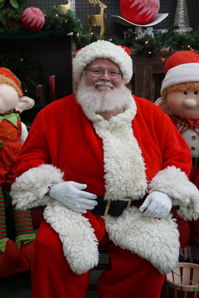 istock Santa Claus with elf decorations 1079379164
