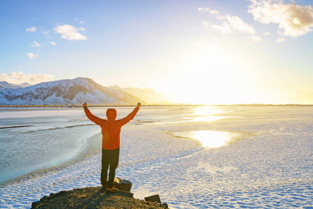 istock Hiker enjoying sunlight during arctic winter 1079388332