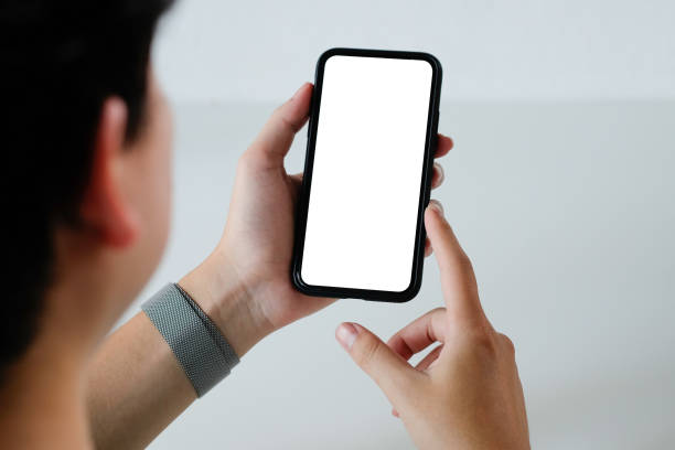 istock Mockup smartphone montage mobile application on a man hands with clipping path. 1079401604