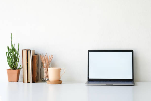 istock Workplace mockup concept. Mock up home decoration laptop and office supply with copy space for products display montage. 1079401646