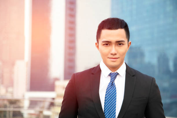 istock young smiling asian business man 1079429752