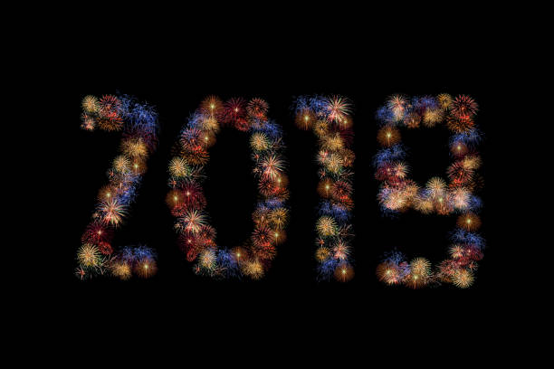 istock Colour fireworks forming new year 2019 AD on black background 1079448050