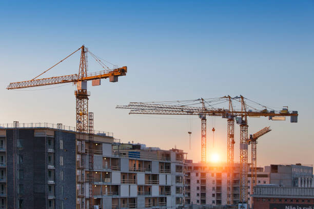 istock Construction cranes work in thef Helsinki in winter 1079474406