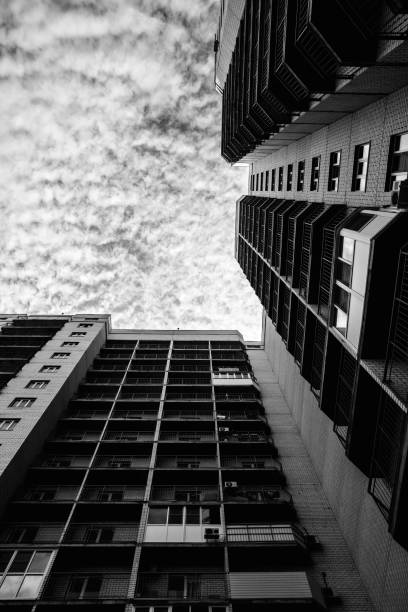 istock a multi-storey skyscraper goes into the cloudy sky in perspective 1079475604