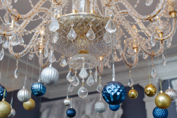 istock Chandeliers decorated  Christmas wreath, close up 1079482710