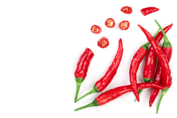 istock red hot chili peppers isolated on white background. Top view. Flat lay pattern 1079486220