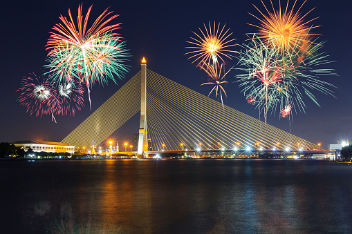 Big Fireworks at Rama VIII Suspension bridge with lighting