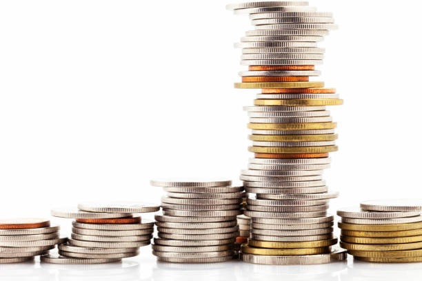 istock row of coin money on white background 1079492468