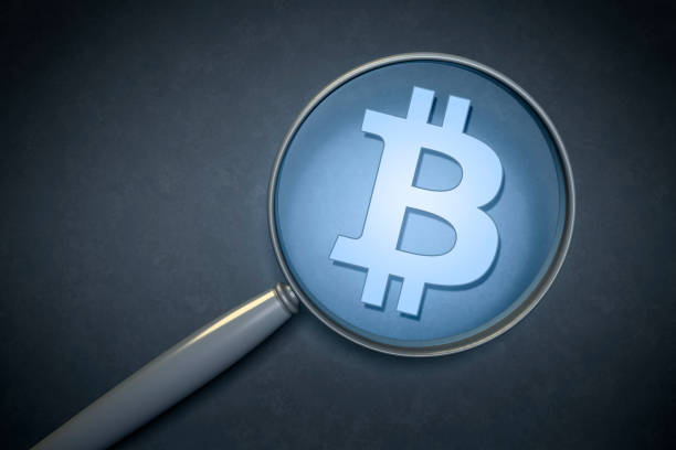 istock magnifying glass with a bitcoin sign 1079492848