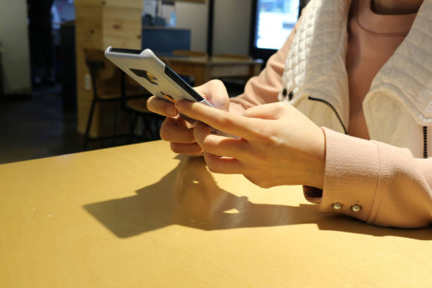 istock woman using smartphones 1079514730
